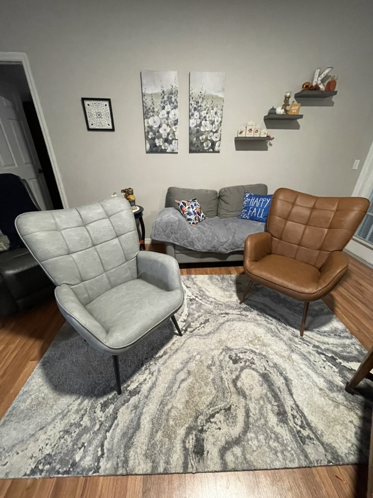 The brown and gray accent chairs acquired for Kurt's Lounge